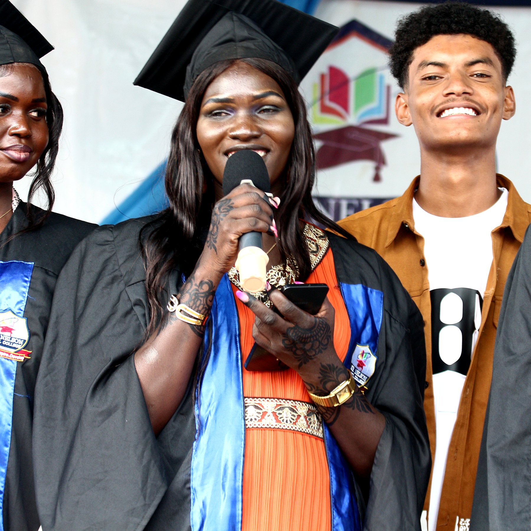 Sir Nelson student speaking at a graduation event